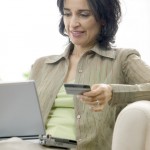 Woman Using Her Credit Card Online